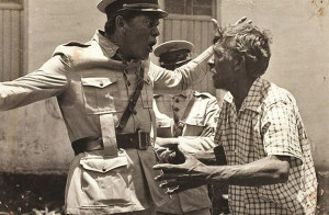 João Joaquim Vieira, no papel de “Inhozinho”, contracena com ator Anselmo Duarte, nas filmagens da história dos irmãos Naves. Foto: Divulgação