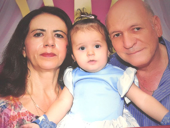 Luiz Carlos F. da Silva aniversariante de amanhã ao lado da esposa Nora e da neta Geovana