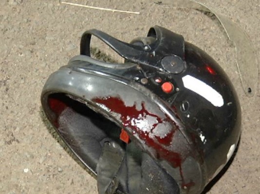 Um dos autores usava capacete e foi baleado